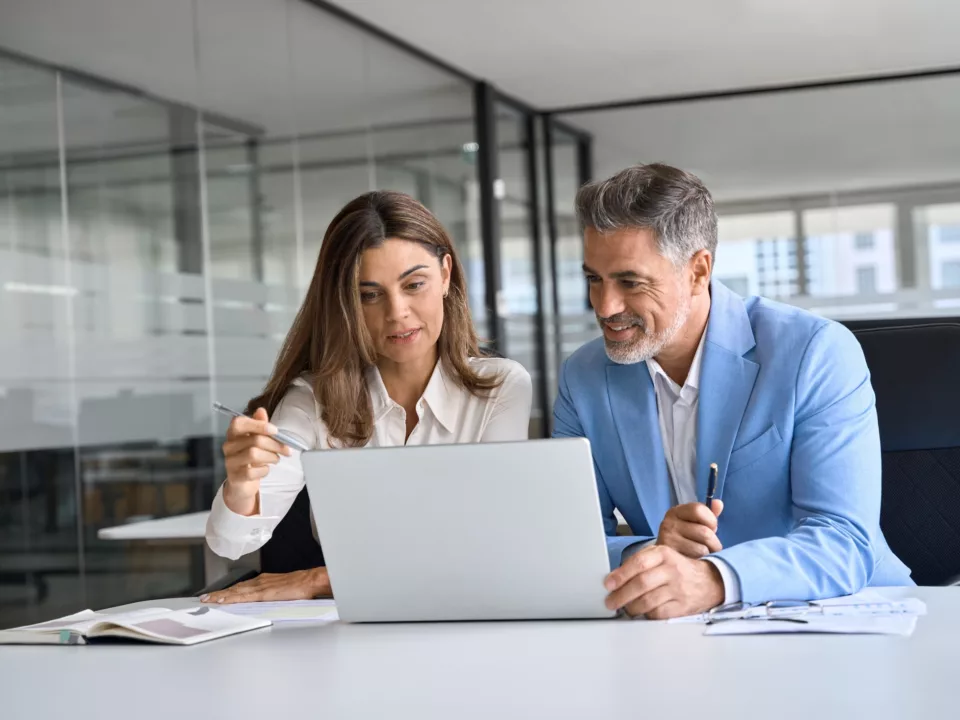 franchisee receiving digital training through a modern LMS platform on a tablet or laptop